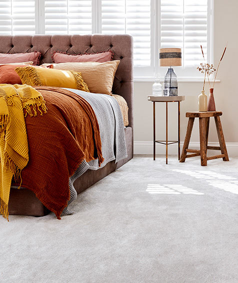 Cosy bedroom carpet fitted by World of Carpets